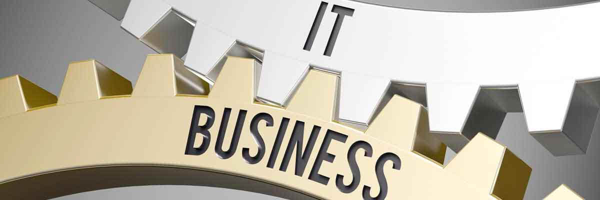 Zwei Zahnräder mit Aufschrift IT und Business greifen ineinander